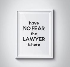 a white framed poster with the words have no fear the lawyer is here