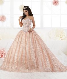 Be the belle of the ball in this all-over glitter tulle princess gown by House of Wu Quinceanera Collection 26896. The strapless sweetheart neckline is accented with corset boning and crystal beading for a touch of drama. This look is complete with a lace up back. House of Wu Quinceanera Collection Fall 2018 Style Numb Princess Quince, Xv Dresses, Back House, Quinceanera Collection, Quinceañera Dresses, Princess Gowns, Quinceñera Dresses, Ballroom Gowns, 2018 Style