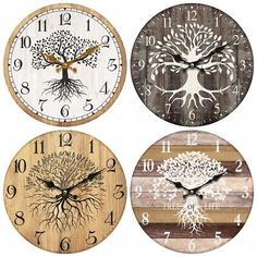 four clocks with different designs and numbers on each one's face, all showing the same time