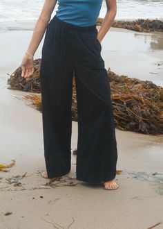 Wide leg unlined Cotton pant with front drawstring, pockets and front pleats. This palazzo pant features a seam detail at the hem, which adds a nautical touch to this trouser. Elevate with a satin top or wear for a casual beach day, this pant is sure to be a summer staple! Wide leg Drawstring waist Unlined Pockets Cotton Palazzo Pant, Wide Leg Pant, Satin Top, Summer Staples, Swim Accessories, Palazzo Pants, Cotton Pants, Gold Filled Jewelry, Jewelry Party