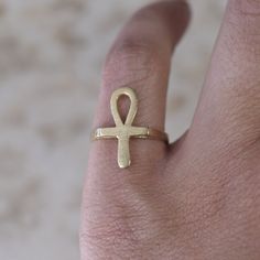 Vintage Egyptian Ankh ring made of 14k solid gold. Era: c.1970s Markings: 14k Material: 14k gold Ring Size: 5 (comes with one free resizing) Condition: Good antique condition with minor surface wear from age Shipping is free in the United States Follow on Instagram @LUXXORVintage Ankh Ring, Egyptian Ankh, Follow On Instagram, Filigree Ring, 14k Gold Ring, Silver Turquoise, Turquoise Sterling Silver, Gold Style, Rings Statement