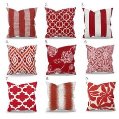 red and white pillows with different designs on them