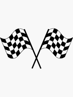 two checkered flags waving in the wind