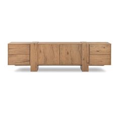 the sideboard is made from wood and has three drawers, one with two doors