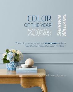 the color of the year wall decal is shown next to a vase with flowers