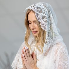 Enhance your spiritual experience with the exquisite beauty of a white floral embroidered veil for church. The Chapel Mantilla Veil is a perfect accessory for those seeking to add an elegant touch to their attire during Mass. Crafted with delicate embroidered lace, this Catholic veil exudes grace and reverence. The intricate floral design on the veil adds a touch of femininity, while the pure white color symbolizes purity and devotion. Its soft and lightweight fabric ensures comfort throughout y Traditional White Veil, White Lace Trim Veil For Ceremony, White Delicate Lace Veil For Ceremony, Church Dress Outfit, Mass Veil, Embroidered Veil, Veil Mantilla, Catholic Veil, Sunday Worship