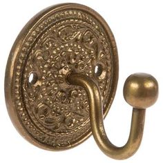 an antique brass door handle on a white background