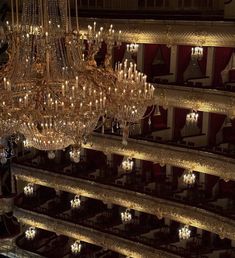 a large chandelier hanging from the ceiling in a building