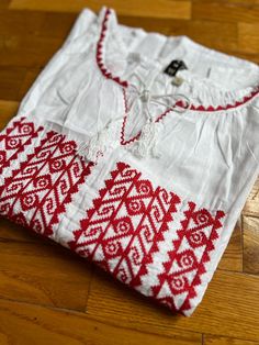 100% cotton White Cotton Tunic Shirt, Red Embroidered Blouse For Festivals, Red Blouse With Embroidered Border For Festivals, Traditional Embroidered Tunic Peasant Top, Cotton Peasant Top With Embroidered Hem, White Embroidered Beach Shirt, Traditional Red Blouse With Embroidered Border, White Embroidered Cotton Tunic Top, White Cotton Embroidered Tunic Top