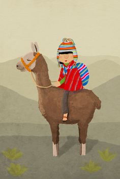 a child riding on the back of a brown llama in front of mountains and trees