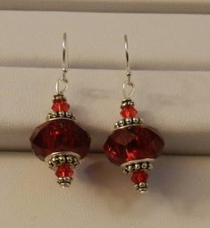 Lovley Red Crystal Bead earrings E4416  Lovely red Crystal earrings Perfect gift for : Birthday / Anniversary / Christmas / Mothers Day / Valentines Day / Fathers Day / Special Occasion PLEASE NOTE: Because each monitor displays colors differently, the colors shown on your monitor may appear varied from the actual piece. Also, the camera will sometimes create some glare and possible shadows on the image shown. Made in a smoke free, pet free home. Crystal Bead Earrings, Valentines Day Earrings, Diy Valentines Day, Selling Ideas, Earrings With Crystals, Romantic Earrings, Beads Craft Jewelry, Winter Earrings, Beaded Earrings Diy