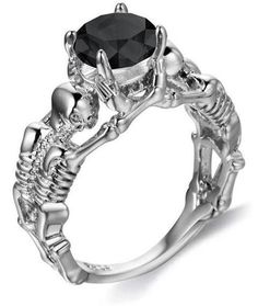 This skull and crossbones ring has a large diamond worn by two skeletons. This diamond revered by its devotees will make you meet many successes. Stainless Steel 316L : does not blacken, resistant to chlorine Zirconium crystals: shine like real diamonds No form of discomfort on your skin Neat details Weight: 20gr STANDARD SHIPPING OFFERED ☠️ Refer to our MEASURING GUIDE if you're not sure what size to order.. ☠️👉Discover our collection Skull Rings Goth Biker, Skeleton Ring, Artisan Rings, Gothic Rings, Rock Chic, Rings Engagement, Ring Pendant Necklace, Unisex Ring, Skull Ring