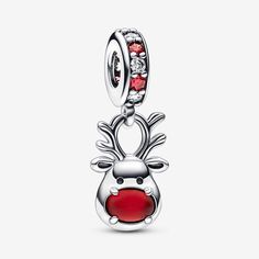 Brighten your holiday season with the Red Nose Reindeer Murano Dangle Charm. This cheery sterling silver reindeer charm features detailed antlers and an iconic red nose created from frosted matte Murano glass. On the reverse, a heart cut-out reveals the festive red of the Murano, and below the heart is the engraving "Let your light shine." The bail is decorated with clear and red cubic zirconia stones for an added touch of holiday magic. | Pandora Red Nose Reindeer Murano Dangle Charm in Sterlin Charms Disney, Pandora Red, Pandora Murano, Red Nose Reindeer, Charms Pandora, Bracelet Pandora, Pandora Bracelet Charms, Let Your Light Shine, Red Nosed Reindeer