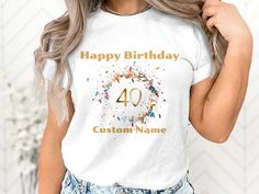 a woman wearing a birthday shirt with the number forty on it