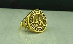 "Made to order - 925 sterling silver signet ring engraved with your college logo, your family crest or any other image that you request. No extra cost for side engravings. Gold plating of the ring is made without extra cost. But gold plating will fade easily. We have also Gold vermeil option. Gold Vermeil is heavy plating about 10-15 times thicker than standard gold plating and sterling silver ring is plated with about 0.40 gr 24k gold. It is much more durable than standard gold plating and will 1983 Ladies Gold Class Ring, 1976 Class Ring, High School Rings, Class Rings College, University Rings, Class Rings High School, School Rings, Class Rings, College Class