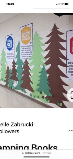 an image of a classroom wall with trees on it and the words learning books below