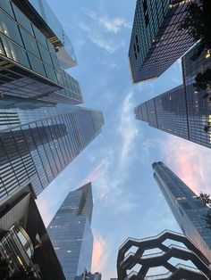 looking up at tall skyscrapers in the city