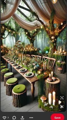 a long table with green chairs and candles on it in the middle of a forest