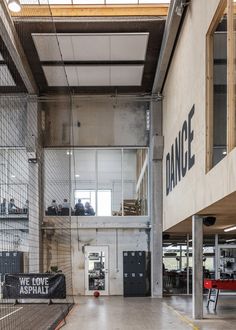 the inside of a large building with lots of windows