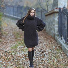 "Oversized wool turtleneck sweater dress for women in bohemian style, great for girlfriend Christmas gift DETAILS - Made from 100% high natural quality wool/pure wool - The model is 170 cm tall (regular S) - The sweater on picture is size 4XL - As mostly all models in our shop the sweater is loose fit - Colour on photo - gray TAKING CARE - Hand wash only - Dry gentle. STANDARTS MOLIMARKS SIZING CHAT - Chest length - measured from armpit to armpit - Garment length - measured from shoulder to the Cozy Fitted Sweater Dress With Chunky Knit, Cozy Long Chunky Knit Sweater Dress, Knitted Knee-length Sweater Dress, Fitted Chunky Knit Long Sleeve Sweater Dress, Big Long Sleeve Sweater Dress Turtle Neack, Pink Sweater Dress, Wool Turtleneck Sweater, Girlfriend Christmas, Roll Neck Top