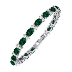 PRICES MAY VARY. AFFORDABLE CUBIC ZIRCONIA TENNIS BRACELET WITH DIAMOND-LIKE BRILLIANCE: With gorgeous White Round CZ, Oval Cut simulated Emerald Gemstones accentuated by Silver Plated Brass, this Tennis Bracelet will add a diamond-like brilliance to any outfits; go on, enjoy the radiance of CZ and simulated gemstones at only a fraction of the price of real diamonds and precious stones. CHARMING GEMSTONE BRACELET FOR ALL OCCASIONS: The perfect present for anniversaries, weddings, graduations, or Emerald Bracelets, Cz Jewellery, Aqua Gemstone, Ladies Gifts, Cartier Bracelet, Cubic Zirconia Bracelet, Silver Bracelets For Women, Emerald Bracelet, Best Gifts For Her