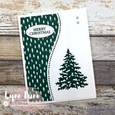 a christmas card with a tree on it