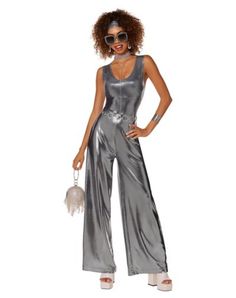 Hit the dance floor in this Silver Disco Jumpsuit! This '60s and '70s-inspired costume includes a silver wide-leg jumpsuit, matching hair scarf, and a glimmering chain belt that add the perfect finish to this party-ready outfit. Includes: Jumpsuit Headband Belt Sleeveless Material: Polyester, spandex Care: Spot clean Imported Note: Shoes and accessories sold separately Disco Halloween Costume, Disco Jumpsuit, Jumpsuit Costume, Disco Costume, Diy Halloween Costume, Disco Outfit, Period Costumes, Hair Scarf, Halloween Costumes For Girls