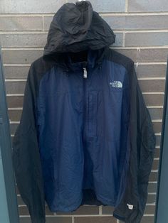 "Vintage 1990s The North Face Windbreaker Jacket - Size  XL (Length 30\", Chest 24\") - Overall great vintage condition (no holes/stains) - Message for more information Please take note of the measurements listed as these are vintage clothes and may fit different than the tag size. Follow our page for more vintage clothing drops! Connect with us on Instagram: @recurarchives" Sporty Black Track Jacket For Hiking, Sporty Outerwear For Hiking, 90s Windbreaker For Outdoor Activities, 90s Style Windbreaker For Outdoor Activities, 90s Style Long Sleeve Windbreaker For Outdoor Activities, Navy Athleisure Windbreaker For Streetwear, 90s Style Long Sleeve Windbreaker For Outdoor, Navy Sporty Windbreaker For Outdoor Activities, 90s Black Windbreaker For Outdoor Activities