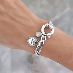 A beautiful bracelet that would make a sweet and heartfelt gift for her, made of 925 sterling silver 2 heart charms Personalize this piece with any name. The bracelet will be sent gift-wrapped and packed in a padded envelope to maintain the product My jewelry are water resistant and comes with 1 year warranty Pls find more of my bracelets here: https://www.etsy.com/il-en/shop/Limajewelry?section_id=16285091&ref=shopsection_leftnav_4 Thank you for your interest. Please check out our other items a Luxury Silver Charm Bracelet For Anniversary, Luxury Sterling Silver Charm Bracelet With Heart Charm, Luxury Silver Heart Charm Bracelet, Cheap Silver Chain Charm Bracelet As Gift, Cheap Silver Heart Bracelet As Gift, Luxury Silver Charm Bracelet For Formal Occasions, Luxury Silver Bracelet With Logo Charm, Luxury Sterling Silver Heart Charm Bracelet, Cheap Personalized Sterling Silver Charm Bracelet