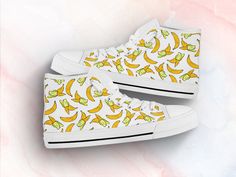 These cute yellow banana shoes are sure to attrack some attention ! Our custom made shoes will make the best gift for any occasion! All of our sneakers are custom-made-to-order and handcrafted to the highest quality standards Check out more of our footwear here: https://www.etsy.com/shop/unicornshoesshop/ Product Name: Yellow Banana Shoes | Banana Sneakers | Cute Shoes | Banana Lover Gifts | Custom High Top Converse Style Sneakers For Adults Women & Men Product Features; ▶ Full canvas double Casual Lace-up Sneakers As Gift, Casual Custom Sneakers With Round Toe As Gift, White Casual Custom Sneakers Gift, Casual White Custom Sneakers As Gift, Casual White Custom Sneakers Gift, Sneakers Cute, Yellow Banana, High Tops Sneakers, Low Top Converse