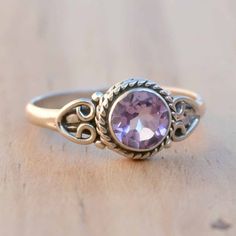 Adjustable Sterling Silver Topaz Ring With Accent Stones, Dainty Amethyst Stackable Rings, Sterling Silver Amethyst Ring With Accent Stones, Adjustable Amethyst Birthstone Ring, Dainty Round Amethyst Ring, Dainty Amethyst Gemstone Ring, Dainty Adjustable Amethyst Ring, Adjustable Sterling Silver Amethyst Ring For Wedding, Adjustable Amethyst Ring With Accent Stones