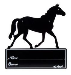 a black horse is standing on top of a sign that says name oomer