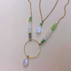 New Gorgeous Layered Handcrafted Exclusive Necklace 18”-26”L 18k Gold Plated Natural Genuine Real Moonstone Rainbow Hue, Green Peridot, Fire Flash Gray Labradorite, Green Emerald, Oval Moonstone Wrapped In Gold Bezel, Irregular Gold Plated Circle. Handcrafted In Us Item Please Review My Other Handcrafted Jewelry On Sale. Additional 10% Discount With Bundle Fast Shipping Gold Moonstone Gemstone Beads Necklace, Gold Moonstone Necklace With Gemstone Beads, Artisan Gold Moonstone Necklaces, Artisan Gold Moonstone Necklace, Sundance Catalog Jewelry, Jewel Tones Fashion, Dainty Gemstone Necklace, Sundance Jewelry, Dove Necklace