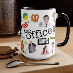 a coffee mug with the office characters on it