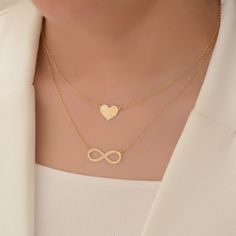 Express your love with our Handmade Heart Necklace crafted in 18K solid gold. This dainty heart pendant is the perfect gift for her, suitable for special occasions such as Valentine's Day, birthdays, and anniversaries.  heart size: 8mm* 8 mm  chain length: about  42 centimeters Material: 14k solid gold and also 10k and 18k gold Style: Minimalism Embrace minimalism with our elegant heart pendant that adds a touch of charm to any outfit. This timeless piece is designed to be cherished and worn every day. Customize your necklace by choosing your desired chain length at checkout. We include a resizable jump ring in the chain, allowing you to adjust it between 40 and 45 millimeters (16 and 17 inches) for the perfect fit. All our items come in an organza bag, making them ideal for gift-giving. I Gold Minimalist Heart Necklace For Anniversary, Gold Double Heart Necklace, Gift For Her, Gold Double Heart Necklace As Gift For Her, Gold Double Heart Necklace Perfect For Gifts, Gold Plated Heart Necklace For Mother's Day Gift, Gold Plated Double Heart Necklace For Mother's Day, Mother's Day Gold Plated Heart Necklace Gift For Her, Mother's Day Double Heart Gold Plated Necklace, Gold Double Heart Necklace Gift