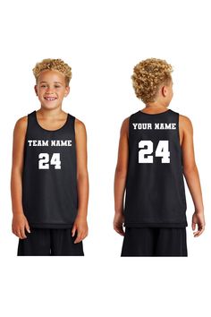 a young boy wearing a black basketball jersey with the number 24 on it and his name