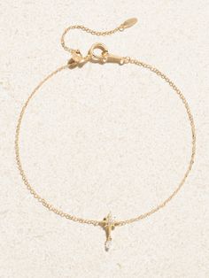 Part of the celestial 'Séléné' collection, Persée's bracelet features a North star pendant that symbolizes direction and guidance. It's made from 18-karat gold and inlaid with 0.06-carats of shimmering diamonds that twinkle like the night sky. Adjust yours to find a comfortable fit. Elegant Sterling Silver Bracelets With Star Charm, Elegant Yellow Gold Jewelry With Star Charm, Yellow Gold Star Charm Bracelet, Celestial Style Yellow Gold Bracelet, Formal White Gold Jewelry With Star Charm, Formal White Gold Star Charm Jewelry, Luxury 14k Gold Jewelry With Star Charm, Designer Hair Accessories, Latest Bracelets