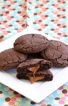 chocolate cookies with peanut butter filling on a plate