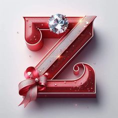 the letter z is decorated with red ribbon and a diamond in it's center