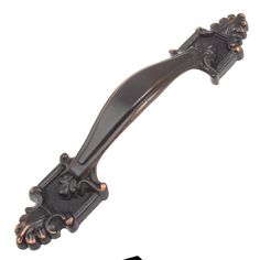 an ornate black metal handle on a white background