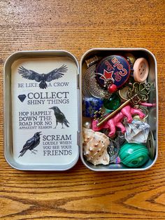 an open tin can with some assorted items in it