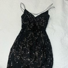 Black Shiny Party Dress From Windsor Brand New Black Sequin Dresses For Night Out, Black Sequined Mini Dress For Prom, Black Mini Dress For Prom Evening, Black Mini Dress For Prom Season Night Out, Black Spaghetti Strap Dress For Party Season, Holiday Evening Mini Dress With Spaghetti Straps, Holiday Mini Dress With Spaghetti Straps For Evening, Black Sleeveless Party-ready Dress, Black Sleeveless Mini Dress For Evening