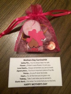 a mother's day survival kit is shown in a clear bag on a table