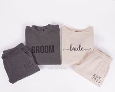 three t - shirts and two pants with the word bride printed on them, sitting next to each other