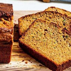 sliced loaf of zucchini bread on a cutting board