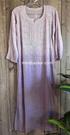 "Chikankari kurta on fine flowy georgette. Beautifully hand embroidered! Liner included. Kurti length-47 inches \"Embroidery designs vary \"" Ombre Chikankari Kurti, Bohemian Georgette Kurta With Zari Work, Bohemian Georgette Kurta With Dabka Work, Bohemian Semi-stitched Georgette Kurta, Spring Semi-stitched Cutwork Kurta, Spring Kurta With Intricate Embroidery In Georgette, Long Georgette Kurta With Intricate Embroidery, Bohemian Kurta With Floral Embroidery In Georgette, Spring Georgette Kurta With Intricate Embroidery