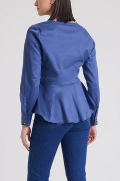 Mila Blouse is a cotton V-neck blouse with long sleeves button cuffs and peplum hem. Concealed size zipper. Classic Fit. Material: 100% Cotton. Model wears size 'S'. Peplum Blouse With Ruffle Hem For Work, Elegant Fitted Long Sleeve Peplum Top, Fitted Long Sleeve Chic Peplum Top, Chic Fitted Long Sleeve Peplum Top, Fitted Cotton Peplum Top With Ruffle Hem, Fall Peplum Top For Workwear, Fall Peplum Top For Work, Fall Season Peplum Top For Workwear, Fall Workwear Peplum Top