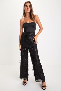 The most glamorous way to elevate any late-night look is with the Lulus Shimmery Aura Black Sequin Fringe High-Rise Wide-Leg Pants! Dazzling fringe-y sequin details adorn these mesh pants that feature a flattering high-rise fit and trendy wide pant legs that fall to full-length hems. Hidden side zipper/clasp. Pair with an equally shiny pair of heels for a truly stunning look! Fit: This garment fits true to size. Length: Ankle length. Size medium Inseam: 29.00 Front Rise: 12.50 Waist: Fitted - ve Elegant Sequined Bottoms For Gala, Fitted Sequin Bottoms For Gala, Fitted Bottoms For Formal Holiday Occasions, Elegant Fitted Bottoms For Holiday, Elegant Fitted Holiday Bottoms, Glamorous Fitted Pants For Gala, Elegant Fitted Bottoms For Party, Chic Wide Leg Pants For Gala, Chic Fitted Pants For Gala