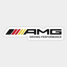 an amg sticker with the words driving performance in black, yellow and red