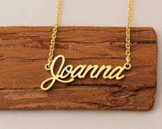 "Name Necklace, Dainty Necklace, Personalized Name Necklace Gold, Tiny Name Necklace Christmas Gift for Joanna This necklace is made of Stainless Steel Available color: Gold, Silver and Rose Gold Chain Length: 14\"16\"18\"20\"22\" inches Processing Time: 2-10 business days Standard Shipping: 10-15 business days to USA. 15-30 business days to other countries. Expedited Shipping: 5-8 business days to USA. 5-10 business days to others. Please do not hesitate to contact us with any concerns." Gold Name Necklace For Party Gift, Gold Name Necklace For Party And Gift, Gold Name Necklace For Party And Gift Occasions, Custom Name Necklace For Christmas, Gold Necklace For Christmas Gift, Gold Name Necklace For Christmas, Gold Christmas Name Necklace, Custom Name Pendant Necklace For Party, Gold Nameplate Necklace For Christmas